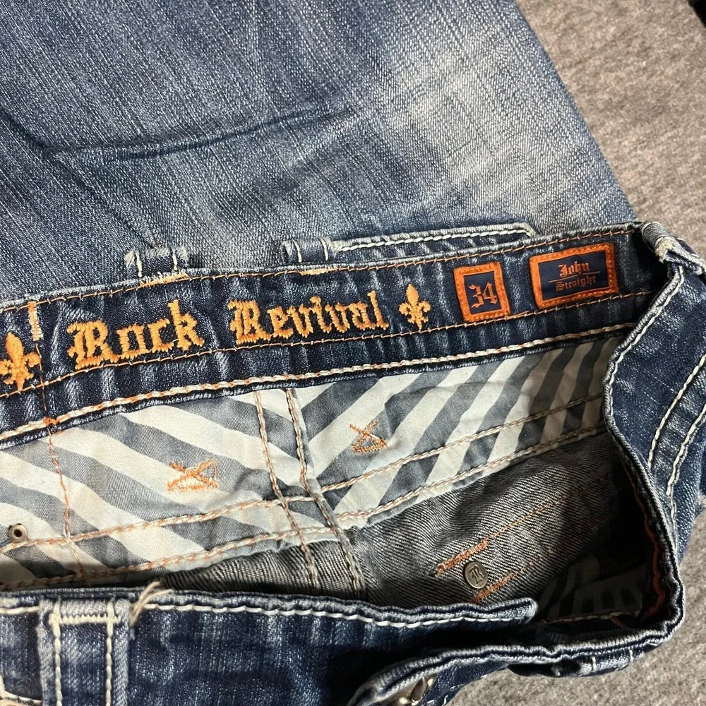 Rock Revival John Straight Distressed Blue Jeans Mens 34 Fleur De Lis Raw Hem